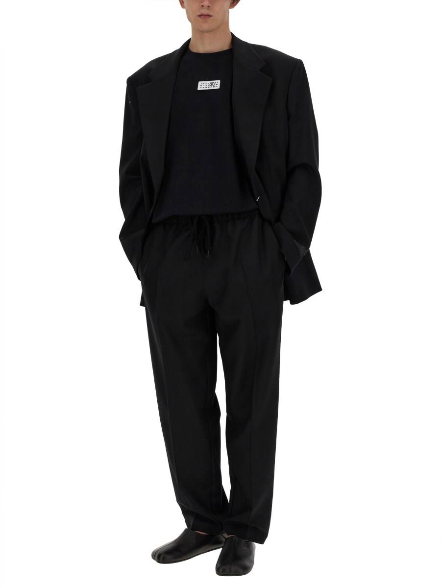 MM6 MAISON MARGIELA PANTALONE IN LANA CON GAMBA AFFUSOLATA I Più Venduti