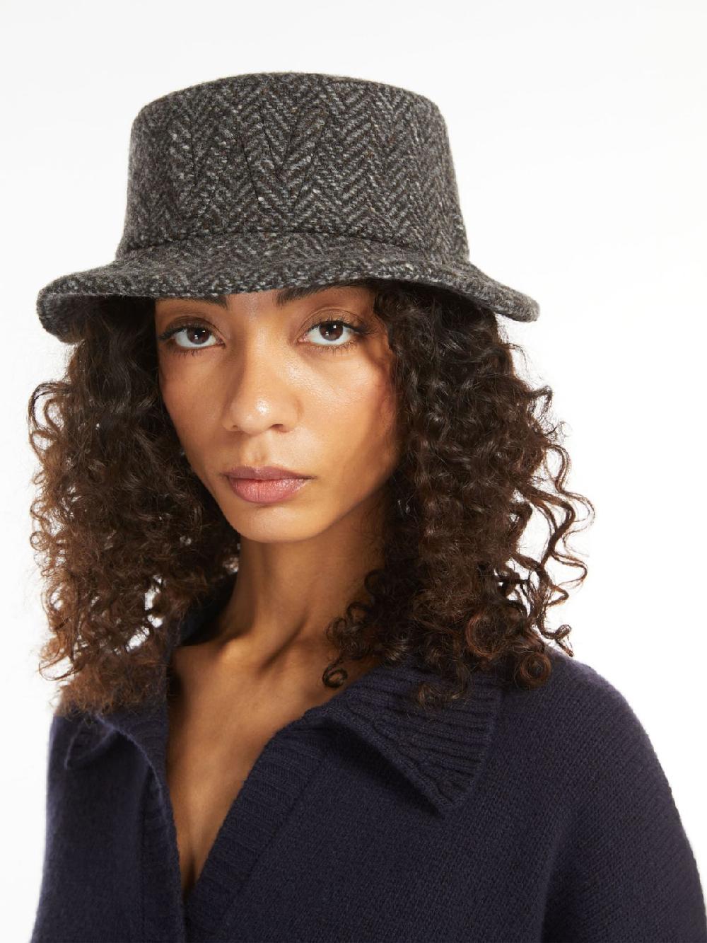 Weekend Cappello in tweed con logo Qualità Garantita